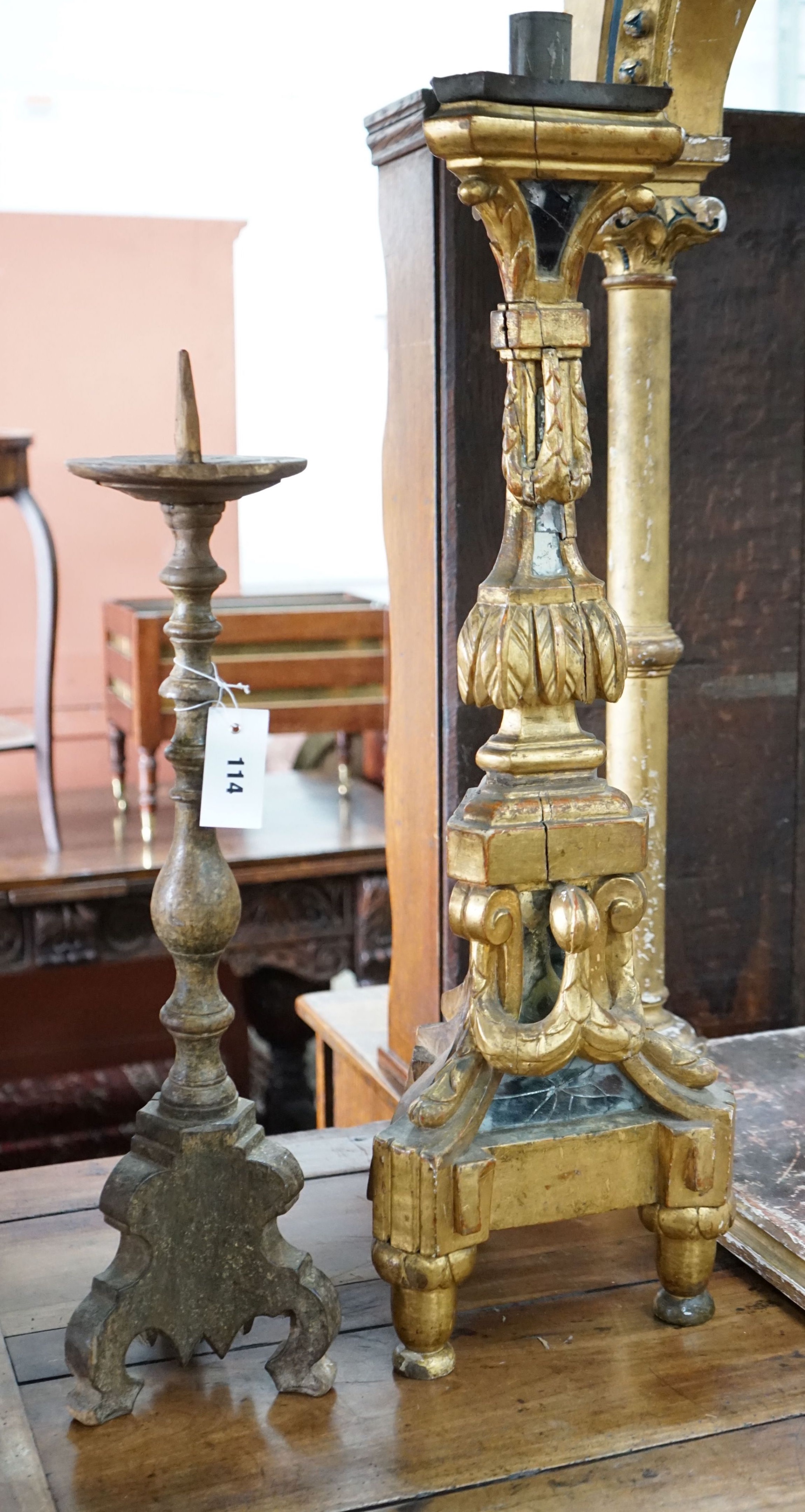 Two 18th century style Italian giltwood altar sticks, larger height 82cm